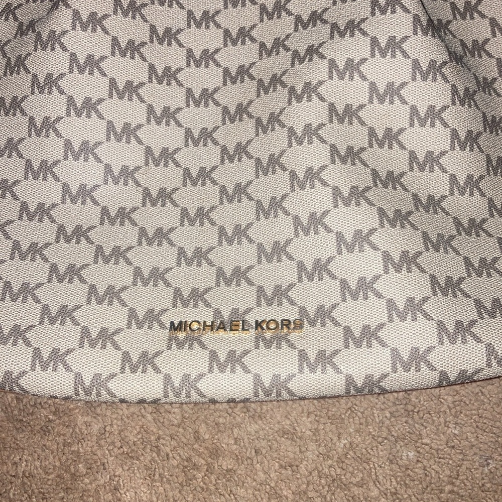 Michael Kors pocketbook brand new logo all over it comes with extra strap